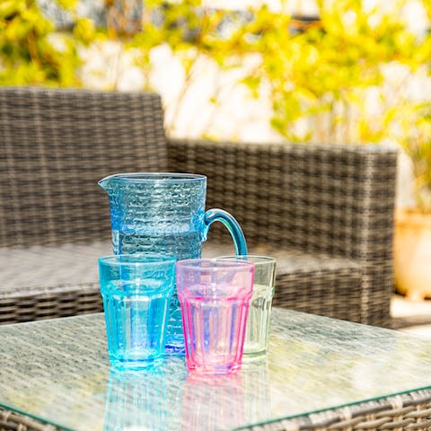 Mix up a jug of your favourite cocktails and enjoy them in the sunny courtyard
