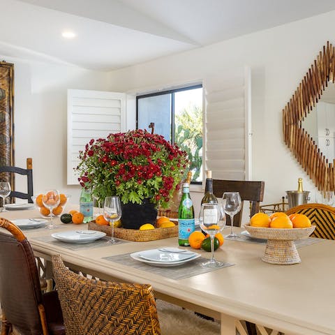 Dining is a dream in the elegant, boho space