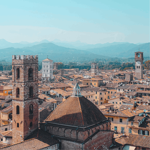 Wander the narrow streets and piazzas of medieval Lucca