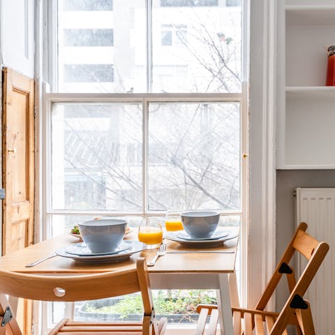 Tuck into a quick breakfast at the table in the window