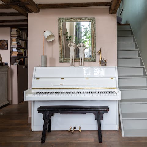 Play a tune on the white piano