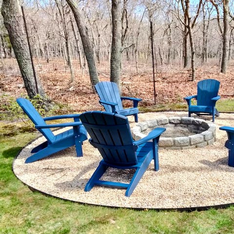 Pull up an Adirondack chair and unwind around the fire pit