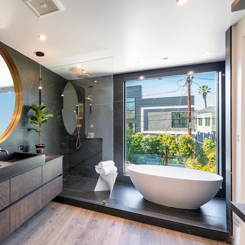 Wind down for the evening with a bubble bath in the luxurious freestanding tub