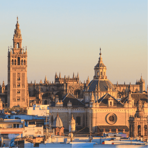 Admire the stunning architecture of Seville Cathedral – it's a short walk away