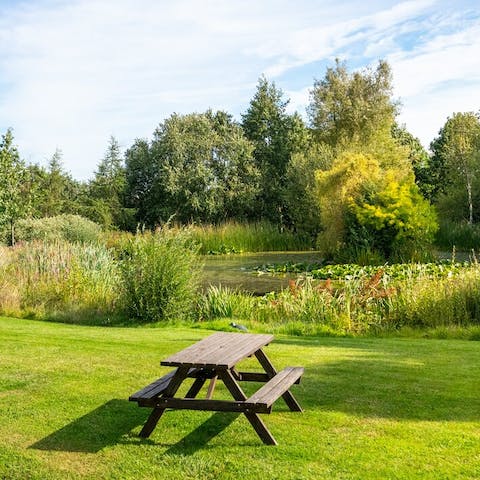 Pack a picnic and enjoy lunch at the table overlooking the pond