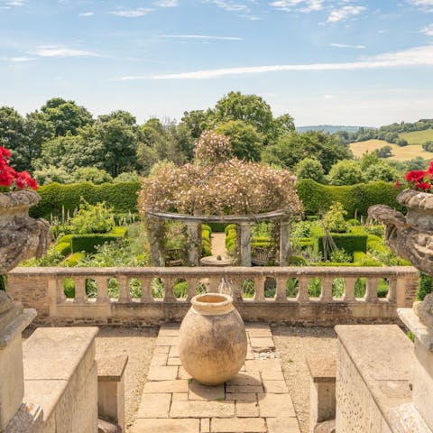 Retreat to the balcony and soak up the incredible garden views and beyond