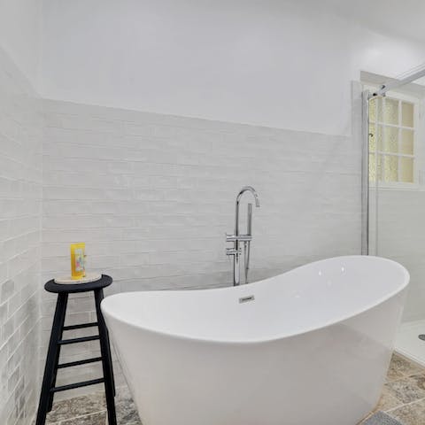 Make time for a long soak in the freestanding bathtub