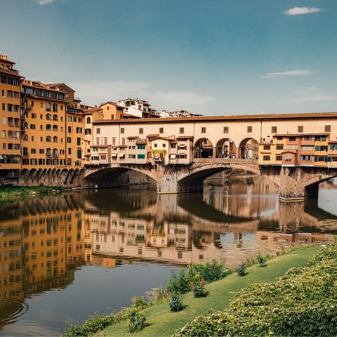 Stroll across Ponte Vecchio, also ten minutes away on foot