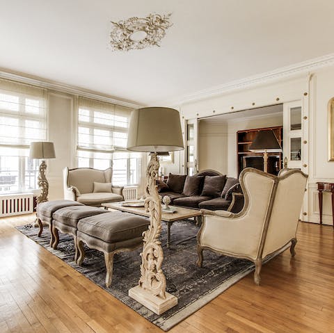 Indulge in a glass of Champagne in the elegant living area after a day of exploring