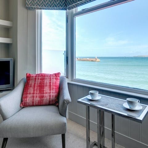 Enjoy a coffee or cocktail with the fabulous sea view