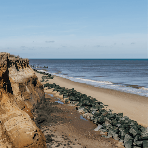 Stroll twelve minutes to the sandy shores of Bacton Beach
