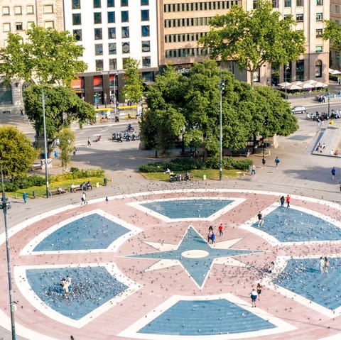 Explore one of the city's main meeting points, Plaça Catalunya, a twelve-minute stroll away
