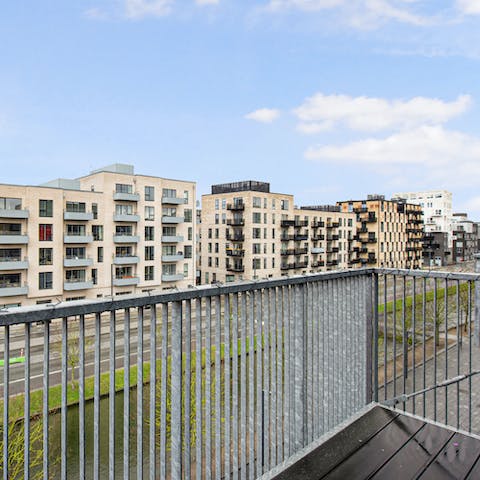 Take in the views of the canal and neighbourhood from the private balcony