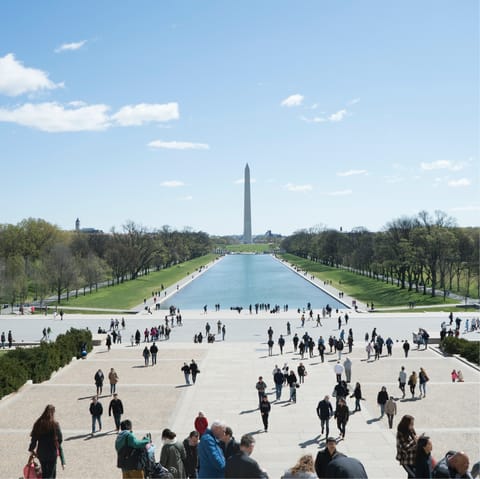 Visit the National Mall, home to the Washington Monument, under a thirty-minute walk away