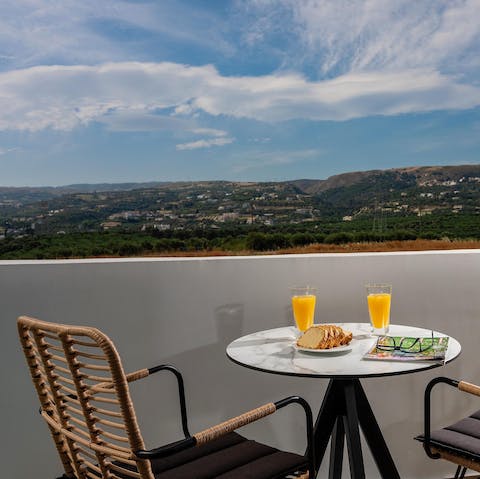 Admire the stunning views over breakfast on the balcony