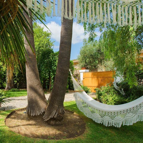 Relax in the hammock with a holiday read in hand 