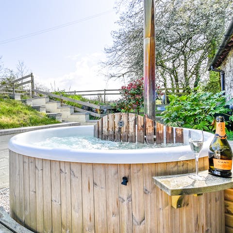 Relax in the wood-fired hot tub