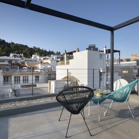 Soak up the sun with your morning coffee from your rooftop terrace