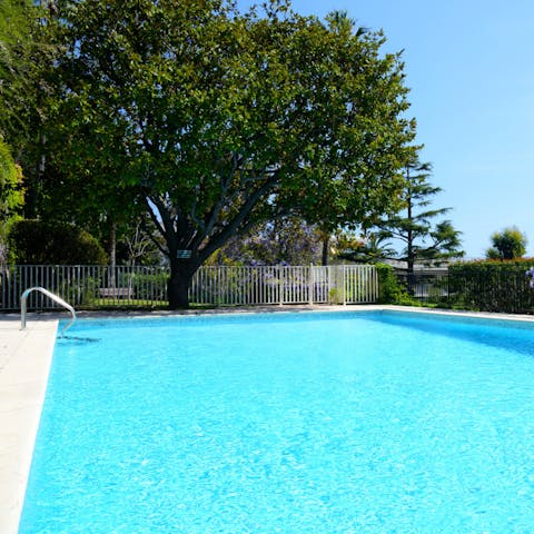 Cool off from the Cannes heat in the communal outdoor pool