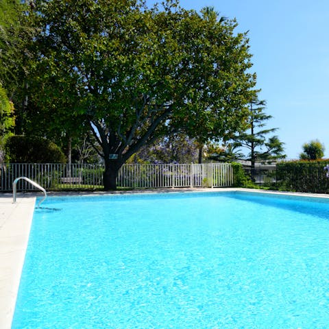 Cool off from the Cannes heat in the communal outdoor pool