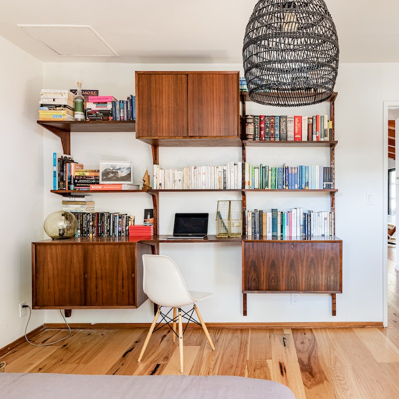 Get a spot of work done at the book-filled desk in the second bedroom
