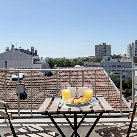 Take in the urban views across Porto from your private balcony