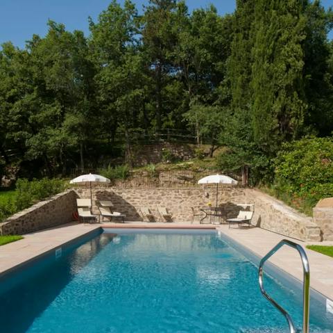 Float under clear summer skies in the private pool
