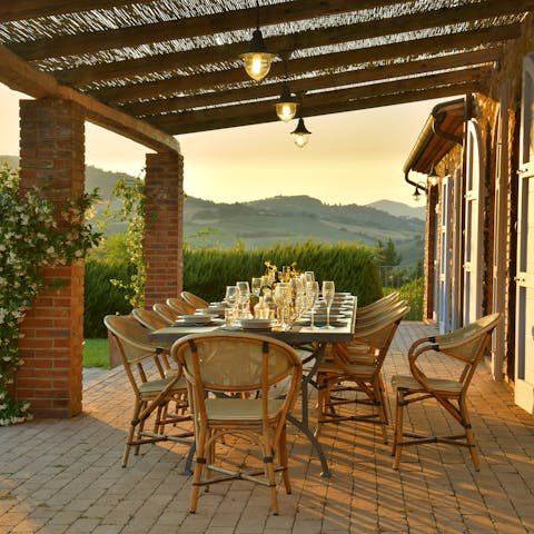 Enjoy dinner on the terrace as the sun sets