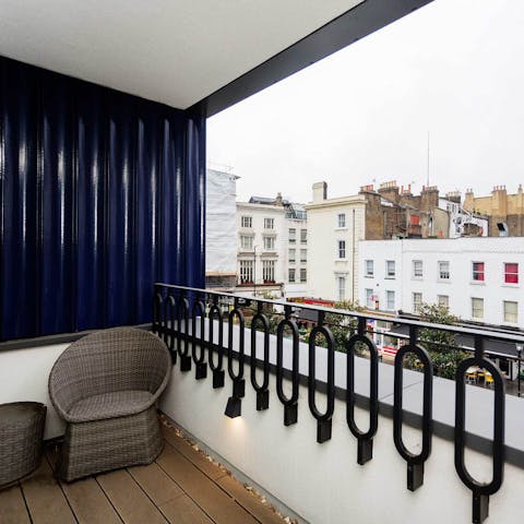 Sip your coffee on the balcony overlooking Bayswater