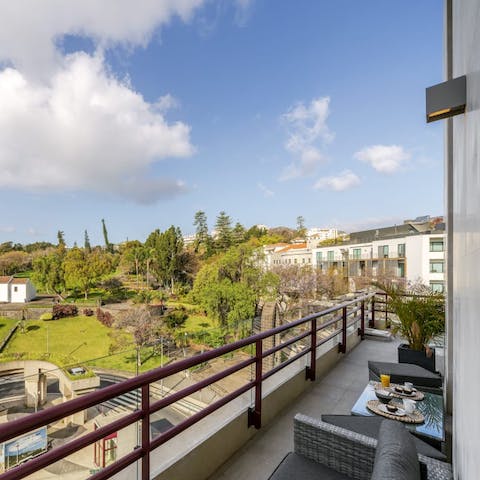 Wake up with a cup of coffee and a sweet pastry on the balcony