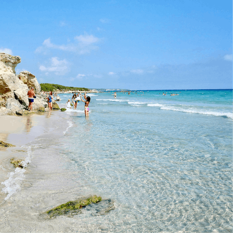 Spend the day on the white sands of Torre Canne, a short drive away