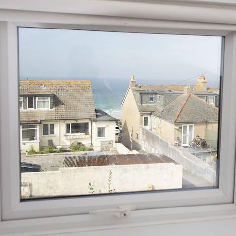 Wake up to sea views and summer sunshine in the main bedroom