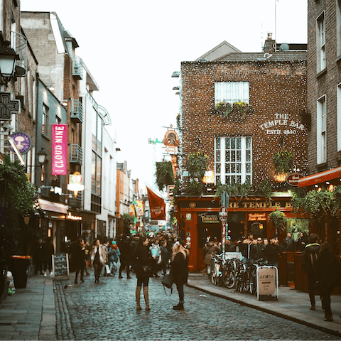 Explore the cobbled streets of Temple Bar just across the river