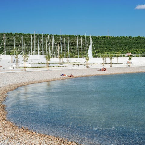 Stroll over to Plaža Punta Bibinje in just over five minutes and splash about in the sea