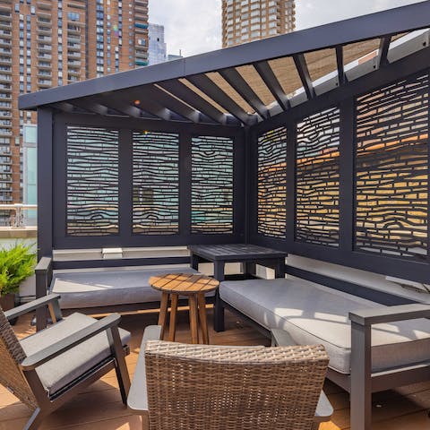 Start your days with coffee on the private rooftop terrace overlooking New York's skyline