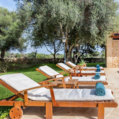 Recline on a sun lounger and soak up the Spanish sunshine 