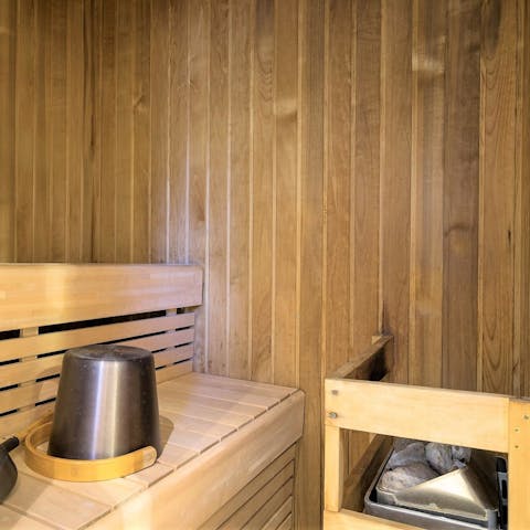 Melt away any aches and pains in the in-home sauna