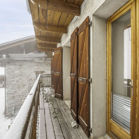 Step out onto the balcony to admire the mountain views