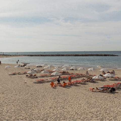Dip your toes in the water at Trumpeldor Beach, just fifteen minutes away