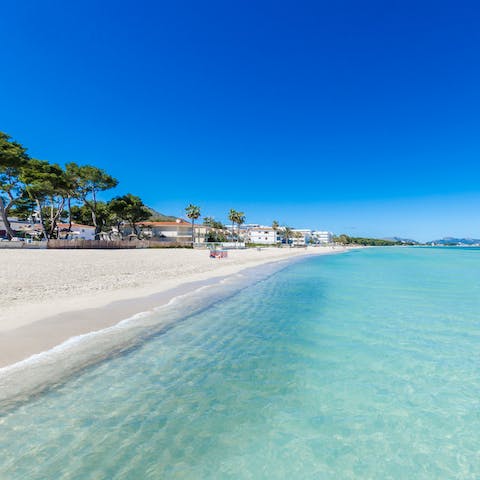 Enjoy the soft sands in Puerto de Alcúdia, just a short stroll from your home