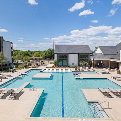 Swim and sunbathe at the resort-style pool 