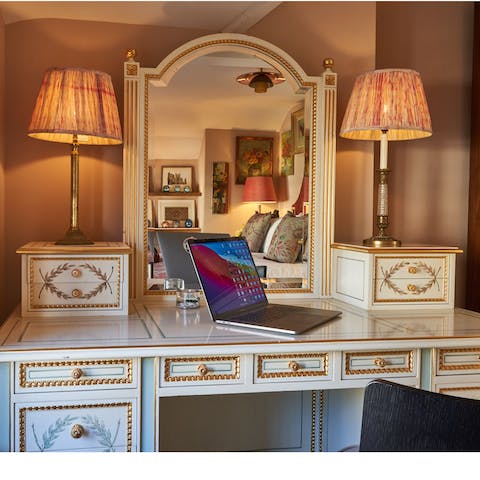 Catch up on work at the vanity desk space