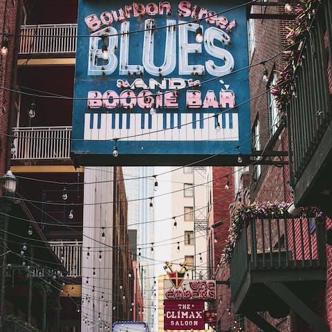 Catch some live music on Bourbon Street, only twenty minutes' walk away