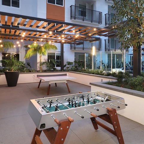 Play a game of table football or table tennis in the fresh air