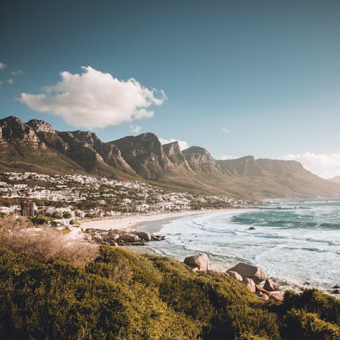Drive four minutes to the buzzing beach of Camps Bay