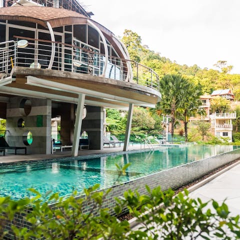 Spend long days lazing by the shared pool under the tropical sun