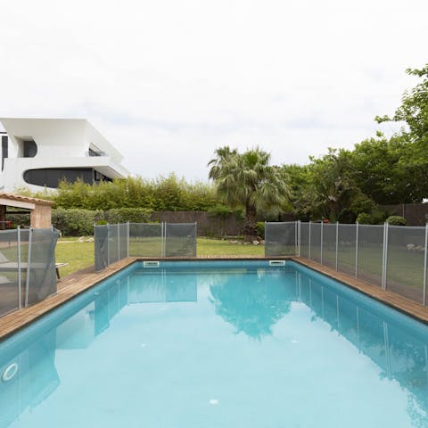 Slip into the private pool and splash in the crystal-clear water