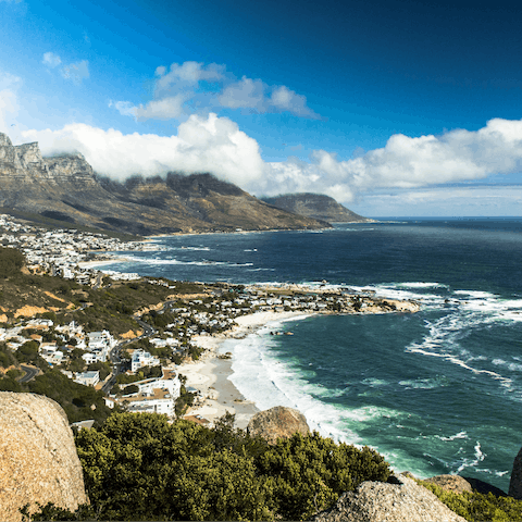 Admire the natural beauty of the rugged landscape of Camps Bay – a short drive away