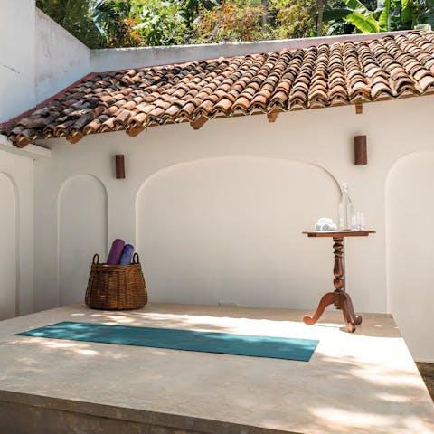 Enjoy an in-villa yoga class, arranged by your host