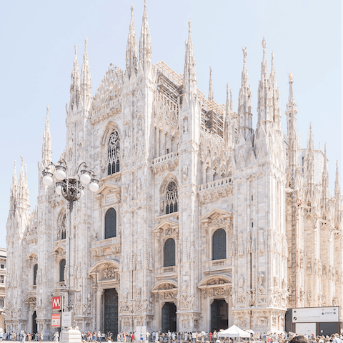 Visit the iconic Duomo di Milano, just a few footsteps from your apartment